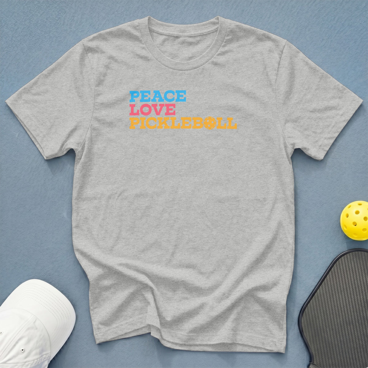 Gray t-shirt with "Peace Love Pickleball" text in blue, pink, and orange.