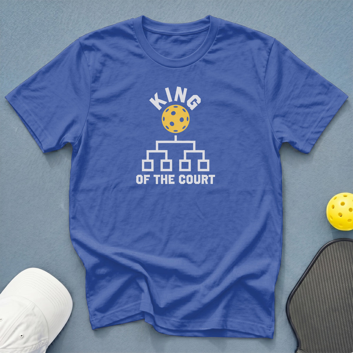 Blue t-shirt with "King of the Court" and pickleball graphic.