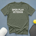 Olive green t-shirt with white "OPEN PLAY VETERAN" text.
