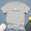 Light grey t-shirt with "Third test design" text and a white circle.