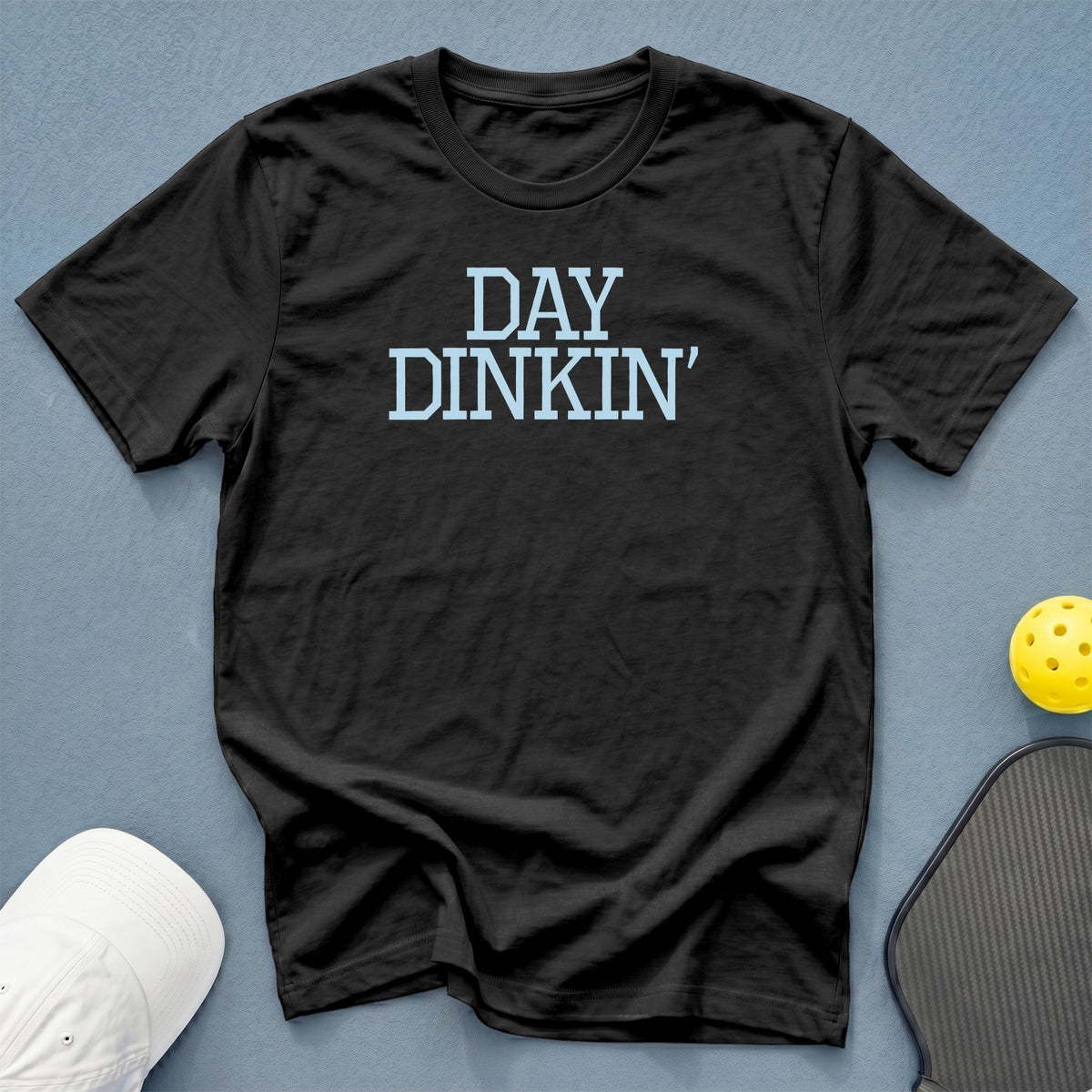 Black t-shirt with light blue text "DAY DINKIN'".