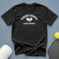 Black t-shirt with "More Dinks Less Worry" and pickleball paddles graphic.