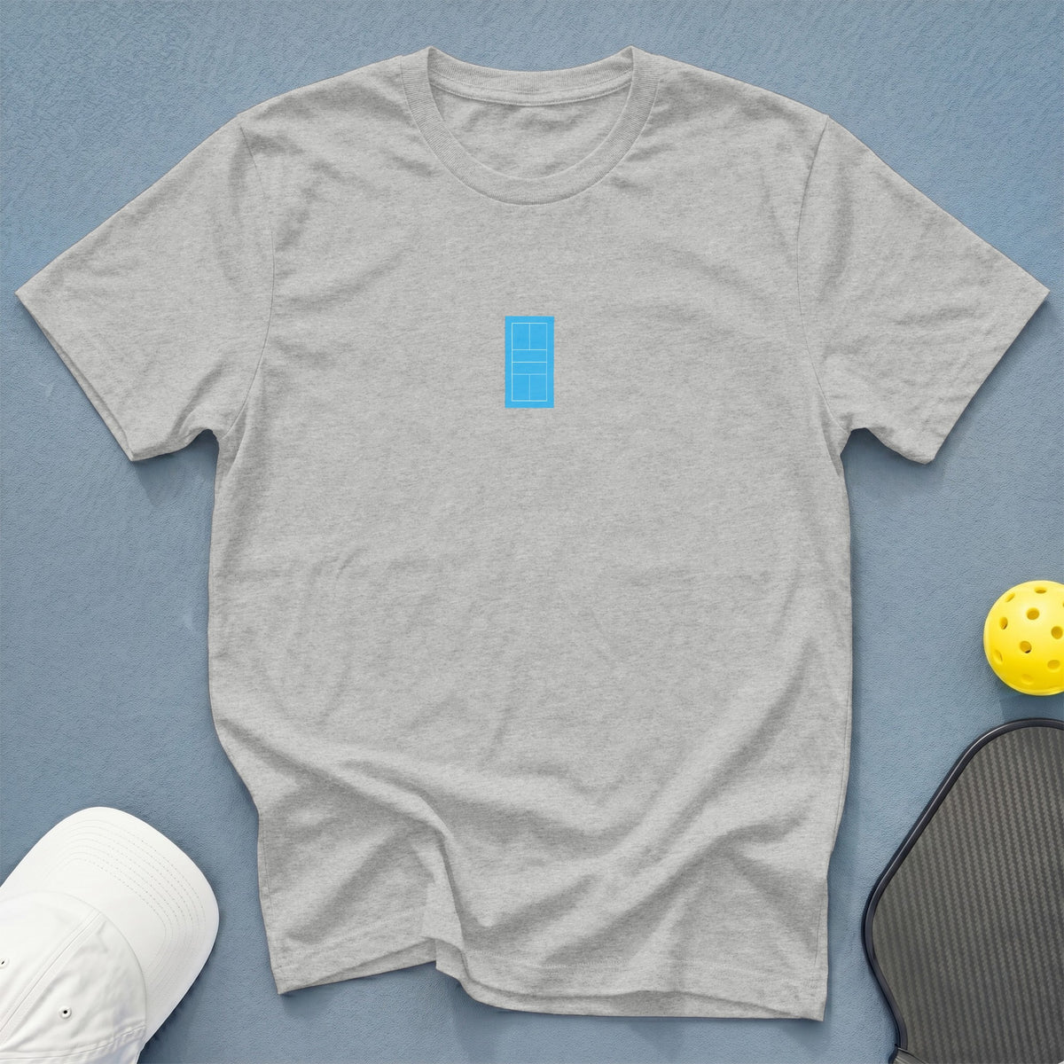 Grey t-shirt with a small blue pickleball court graphic on the chest.