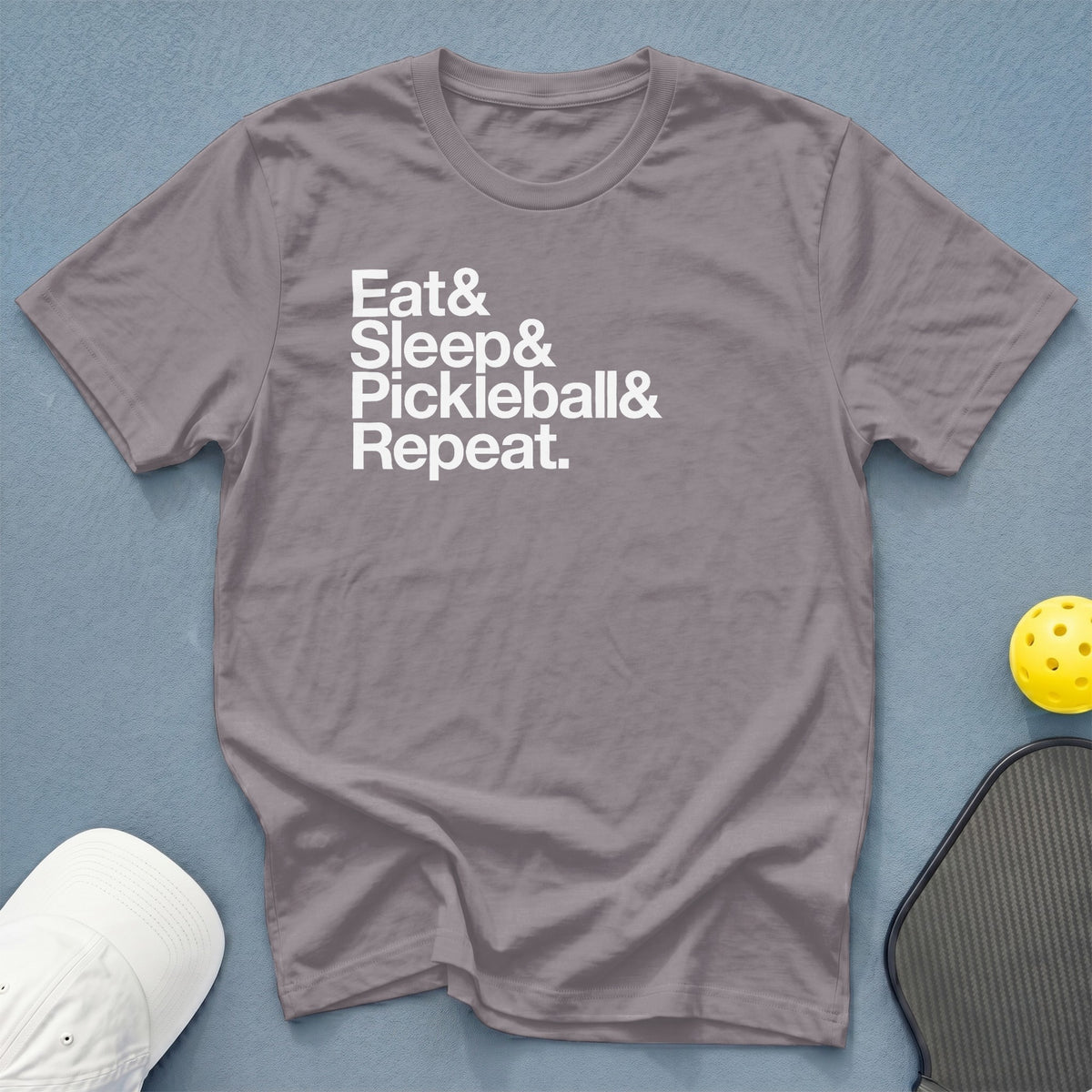 Gray t-shirt with white text: Eat & Sleep & Pickleball & Repeat.
