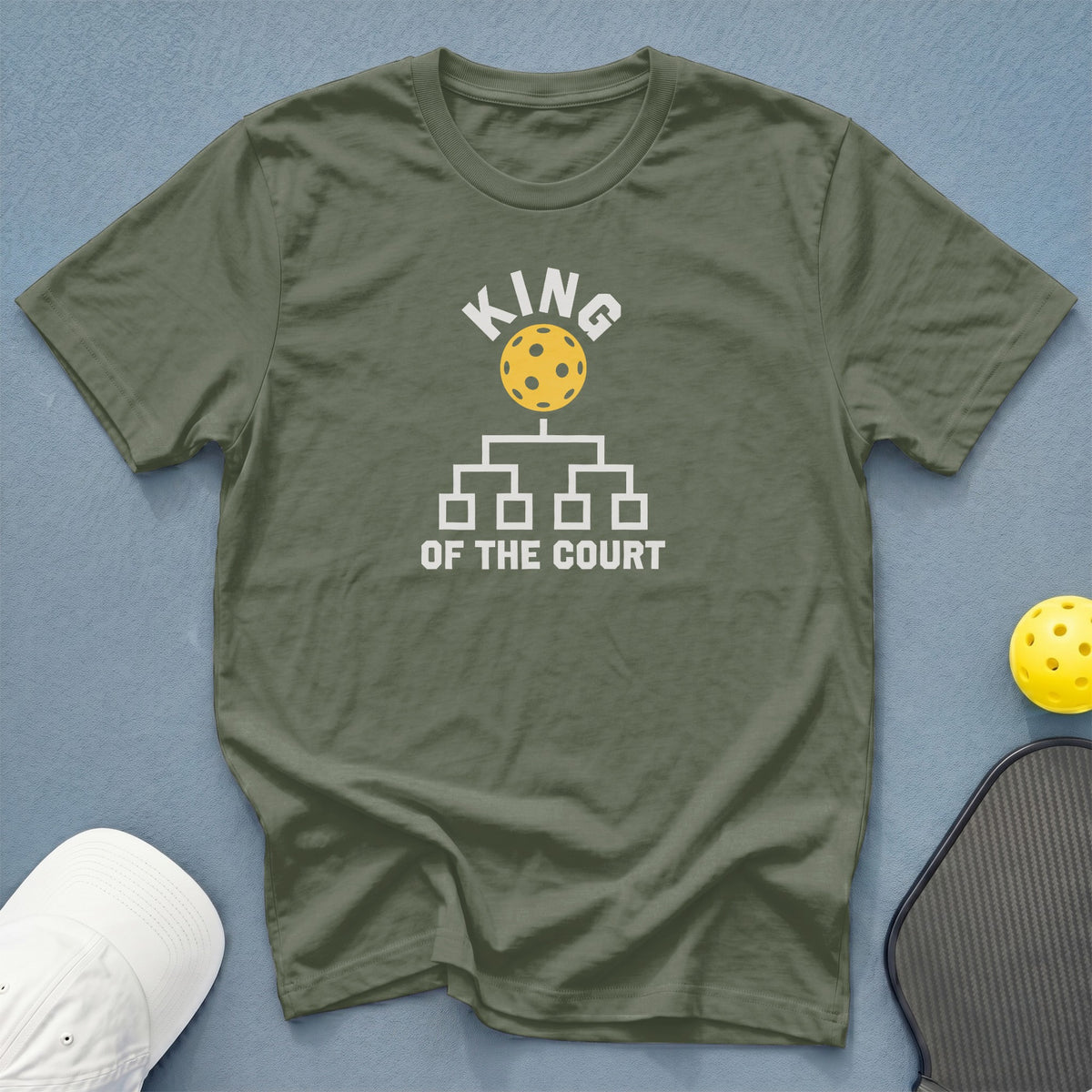 Olive green t-shirt with "KING OF THE COURT" and pickleball graphic.