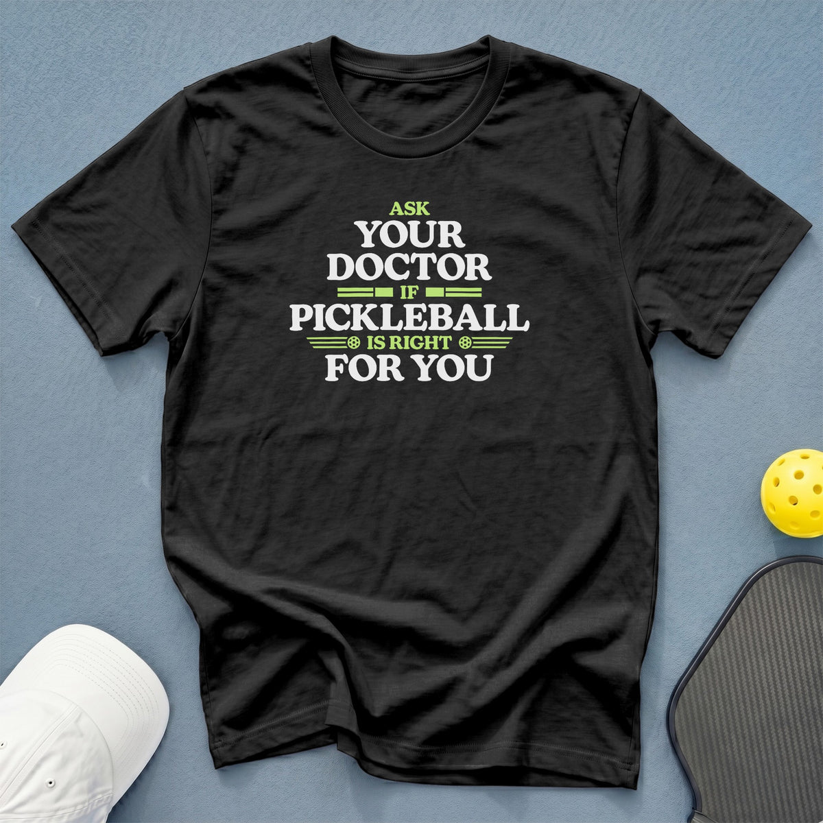 Black t-shirt with text "Ask your doctor if pickleball is right for you".