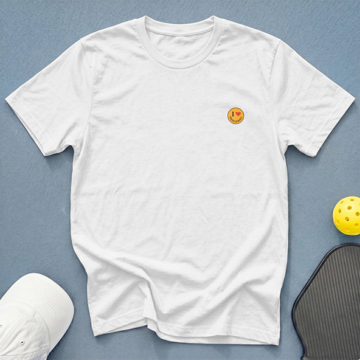 White t-shirt with "I love Pickleball" graphic on chest.