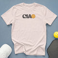 T-shirt with "CIAO" text and pickleball graphic, next to pickleball gear.