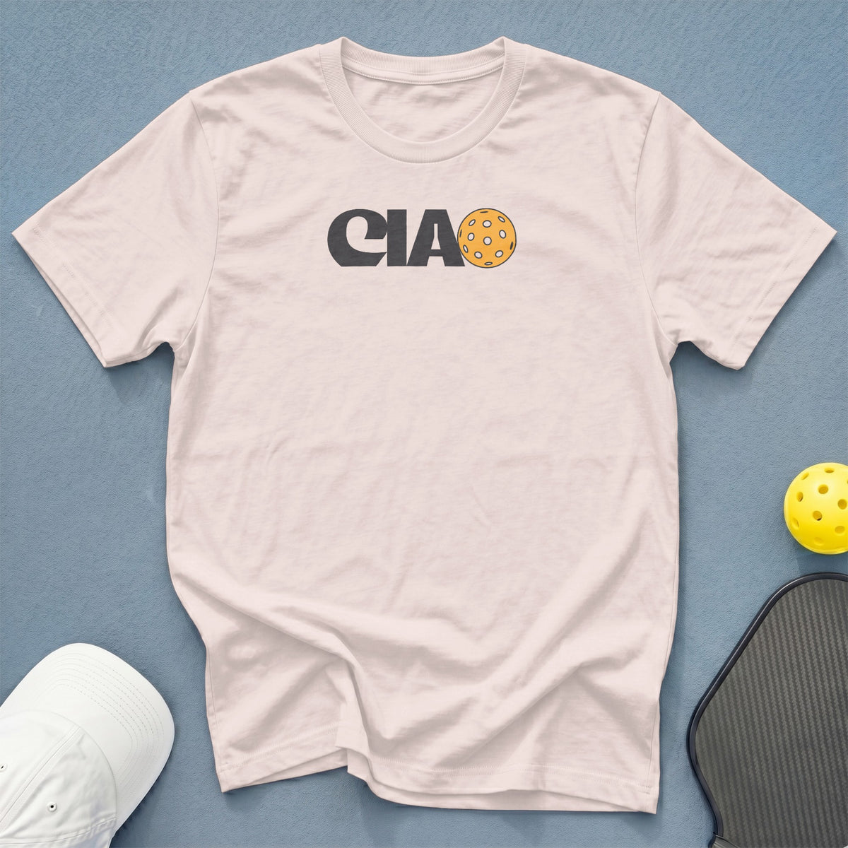 Pink t-shirt with "CIA" text and a pickleball graphic.