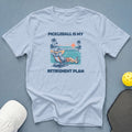 Light blue t-shirt with graphic: "Pickleball is my retirement plan."