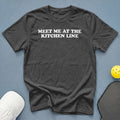 Dark grey t-shirt with white text "MEET ME AT THE KITCHEN LINE".
