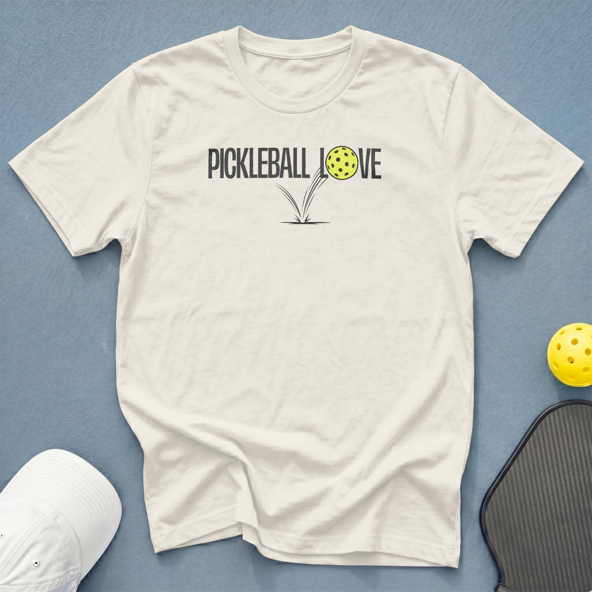 Cream t-shirt with "Pickleball Love" text and a pickleball mid-air.
