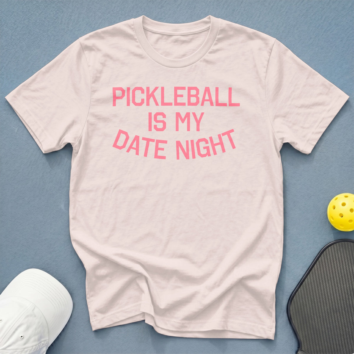 Pale pink t-shirt with "PICKLEBALL IS MY DATE NIGHT" in pink text.