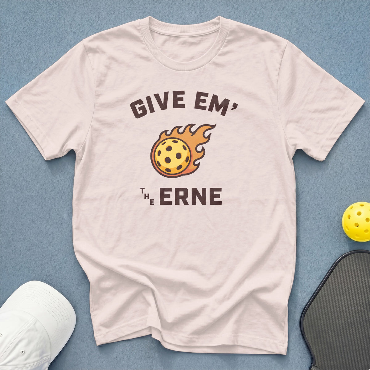 White t-shirt with "GIVE EM' THE ERNE" and flaming pickleball graphic.