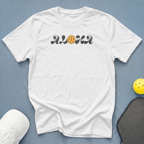 White t-shirt with "ALOHA" text and pickleball graphic.