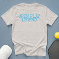 Light gray t-shirt with "OPEN PLAY LEGEND" in blue text.