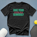Black t-shirt with "TAKE YOUR dinks SERIOUSLY" text and pickleball accessories.