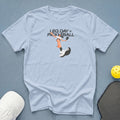 Light blue t-shirt with "LEG DAY = PICKLEBALL" text and pickleball player graphic.