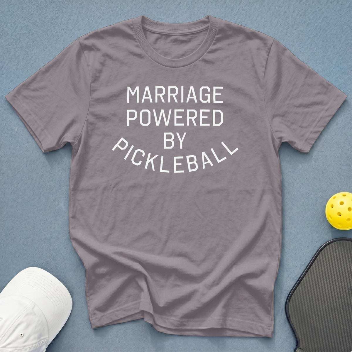 Gray t-shirt with "MARRIAGE POWERED BY PICKLEBALL" graphic, pickleball, and paddle.