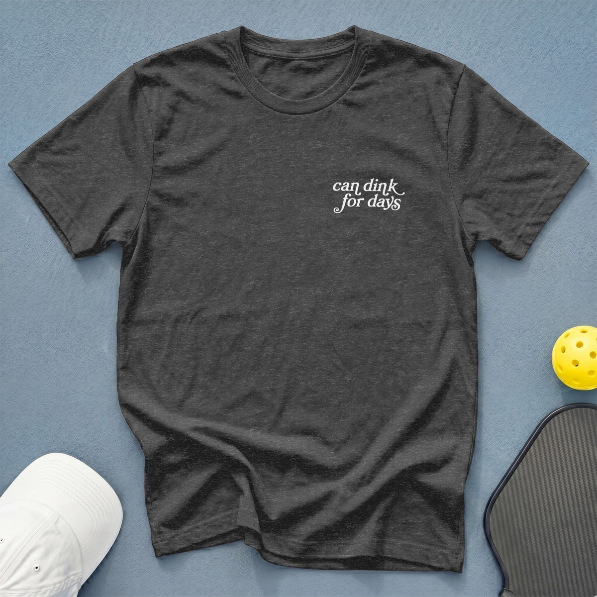 Dark gray t-shirt with "can dink for days" text, pickleball paddle, and ball.