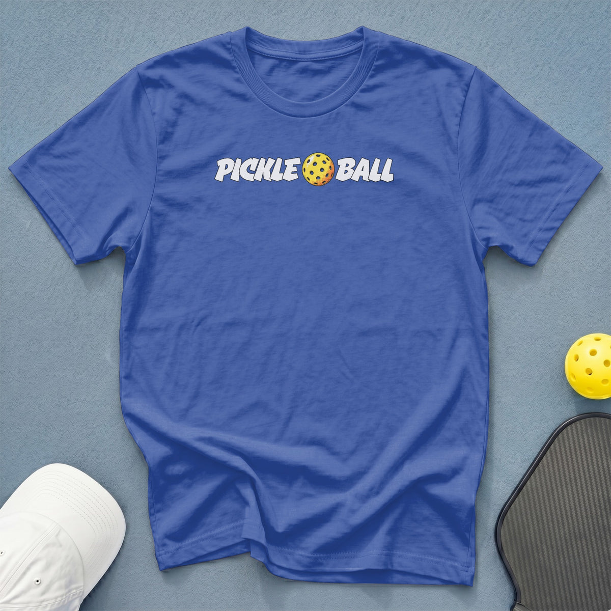 Blue t-shirt with white "Pickle Ball" text and a pickleball graphic.