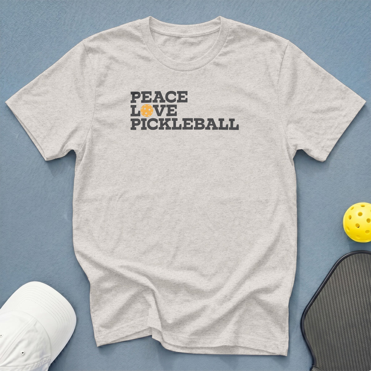 Light grey t-shirt with "PEACE LOVE PICKLEBALL" text and a pickleball graphic.