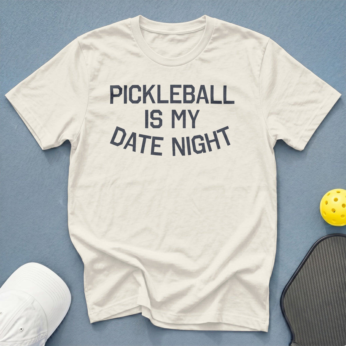 Cream t-shirt with "Pickleball Is My Date Night" text, pickleball, and paddle.
