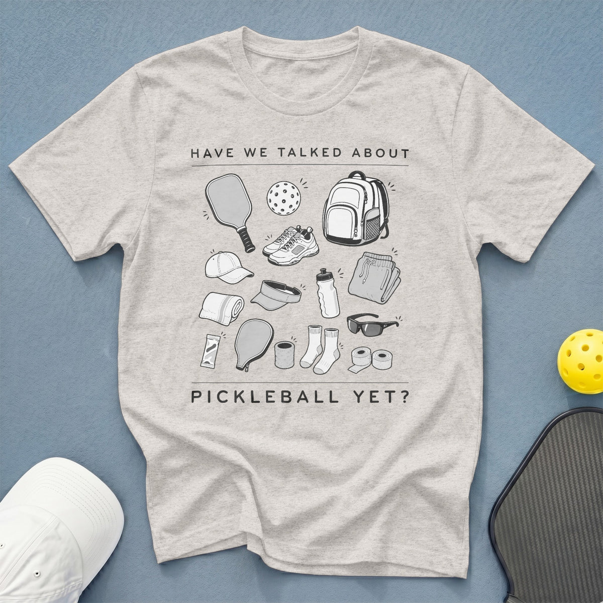 T-shirt graphic with pickleball gear and text "HAVE WE TALKED ABOUT PICKLEBALL YET?".
