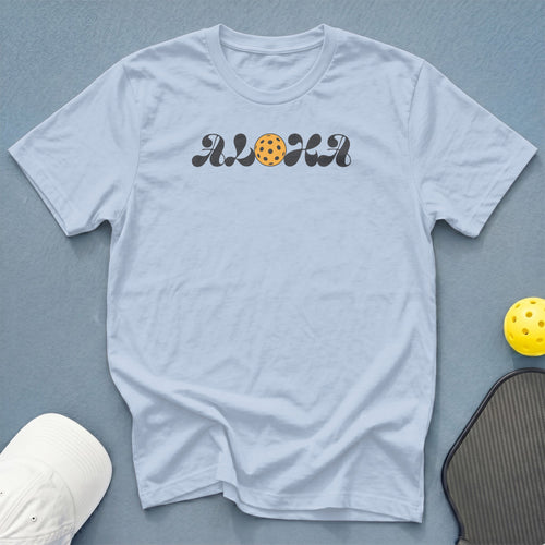 Light blue t-shirt with "ALOHA" text and pickleball graphic.