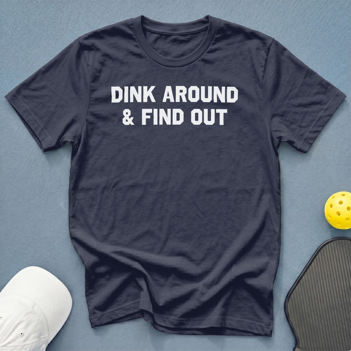 Dark t-shirt with white text "Dink Around & Find Out".