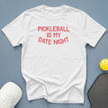 White t-shirt with red text reading "PICKLEBALL IS MY DATE NIGHT".