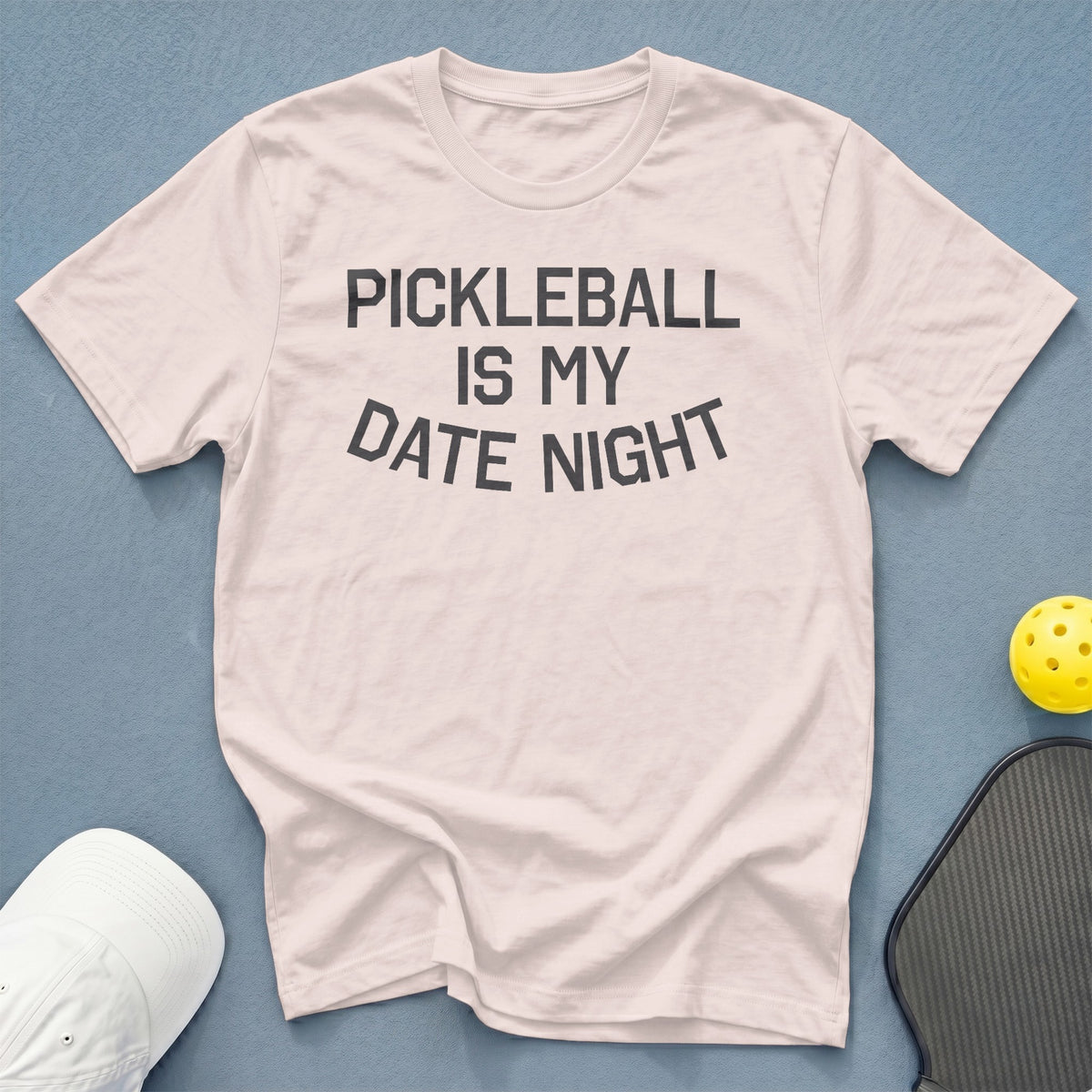 Light pink t-shirt with "PICKLEBALL IS MY DATE NIGHT" printed in black.