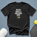 Black t-shirt with "IN MY NASTY NELSON ERA" text and pickleball net graphic.