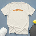 Cream t-shirt with "This Is My Pickleball Shirt" text, pickleball, and paddle.
