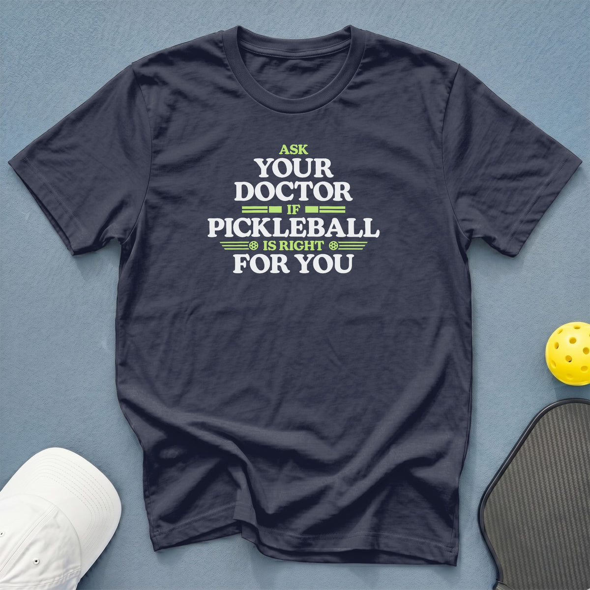Navy t-shirt with text asking your doctor if pickleball is right for you.