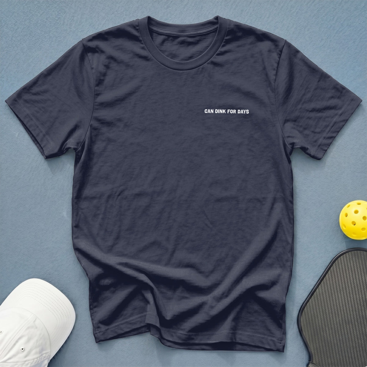 Dark blue t-shirt with white text "CAN DINK FOR DAYS".