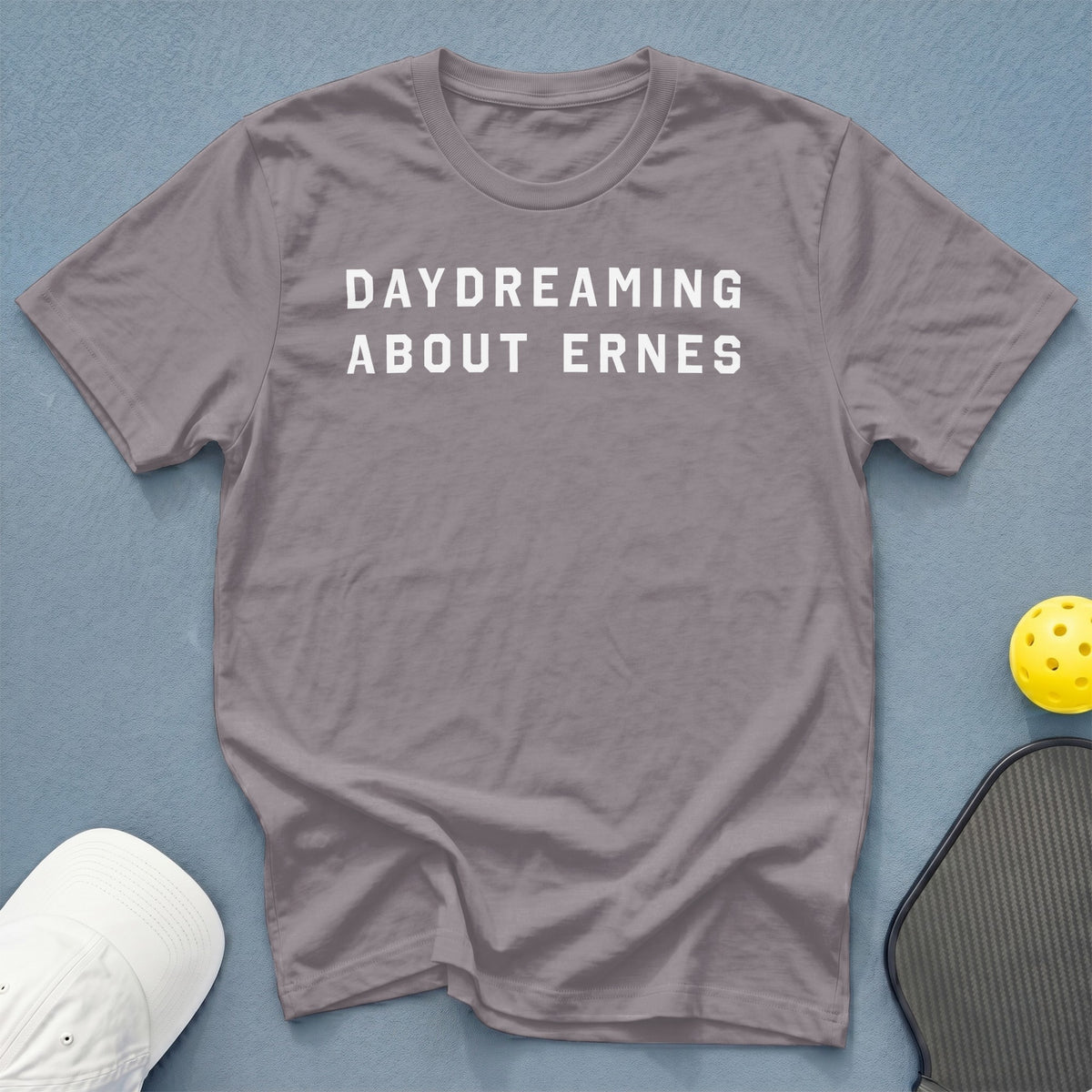 Gray t-shirt with white text "DAYDREAMING ABOUT ERNES".