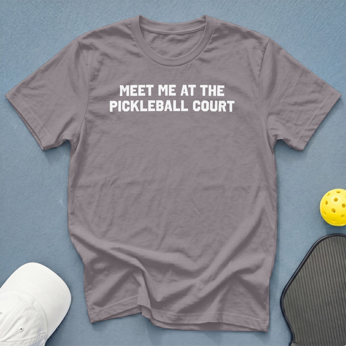 Gray t-shirt with white text "MEET ME AT THE PICKLEBALL COURT."