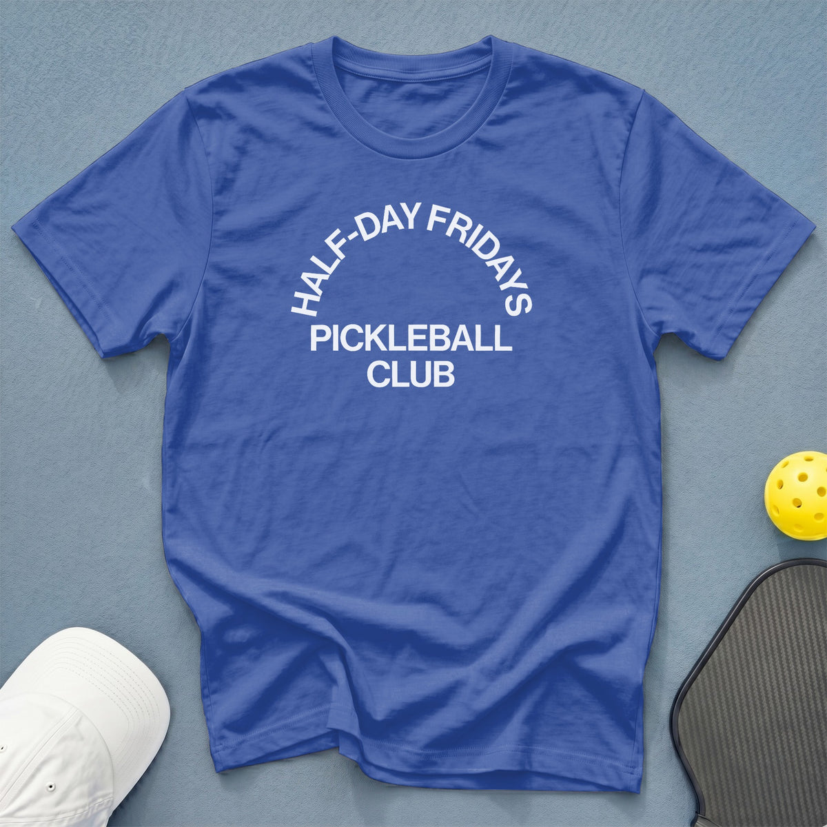 Blue t-shirt with white text "Half-Day Fridays Pickleball Club."