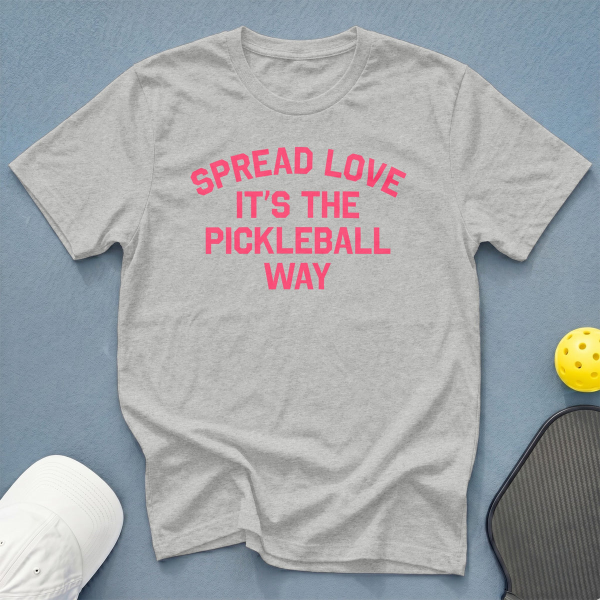Grey t-shirt with pink text "Spread Love It's The Pickleball Way".
