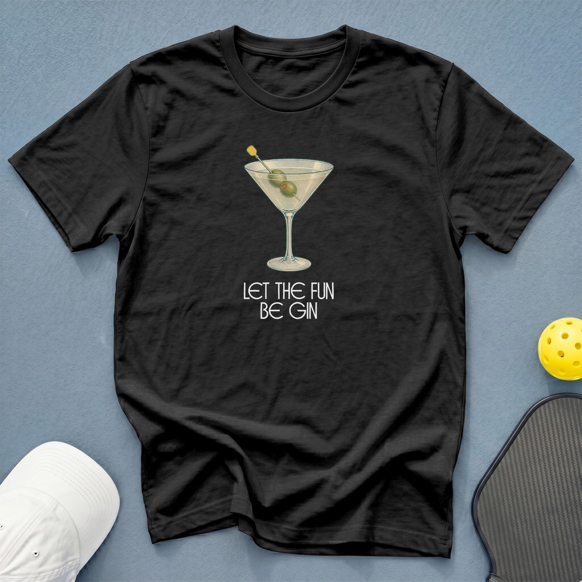 Black t-shirt with martini glass graphic and text "Let the fun be gin."
