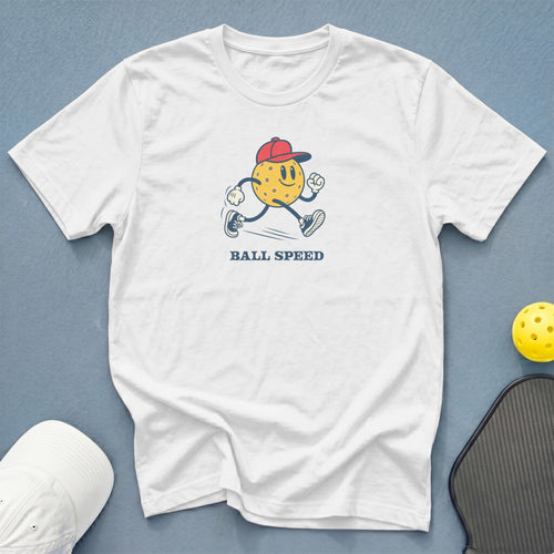 White t-shirt with cartoon pickleball character and text "BALL SPEED".